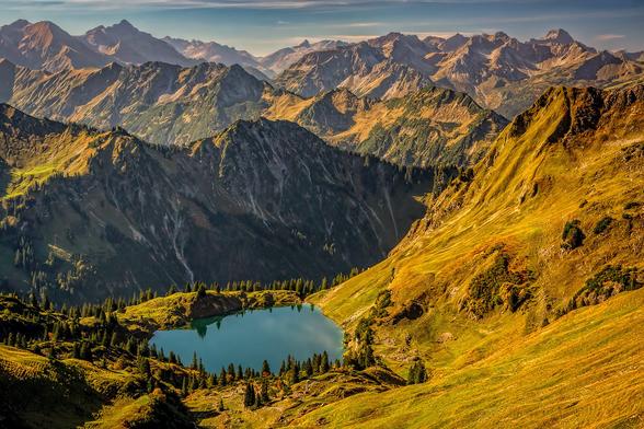 A year ago I was hiking in the German Alps. I took the cable lift up to the Nebelhorn and had a wonderful time.

At an altitude of 2000 meters, temperatures were around 21 degrees Celsius, the sun was shining and shorts and t-shirt were enough. I walked to the rim where you could see the Seealpsee, and because it looked so inviting I walked all the way down. 

Earlier I already posted this shot <a href="https://www.flickr.com/photos/115540984@N02/53403204664/in/dateposted">www.flickr.com/photos/115540984@N02/53403204664/in/datepo...</a>. Were there a lot of people around the top of the cable lift, 15 minutes walking further, no one was to be seen anymore, so I enjoyed this wonderful view of the mountains behind the Seealpsee on my own.