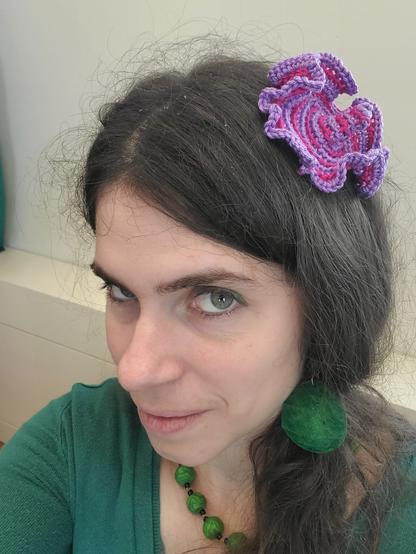 In my hair it looks like a flower or tiny hat.