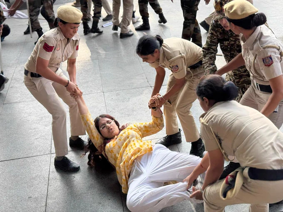 Delhi students protesting and seeking concessional travel in the Delhi Metro rail is being dragged by police.