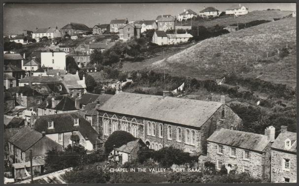 Monochrome real photographic postcard showing a view of the Wesleyan Chapel in the Valley at Port Isaac in Cornwall.
Publisher not stated, not numbered, c.1960.
Postally unused.
Very good condition, with very slight corner bumps, but very small crease to bottom right corner.
