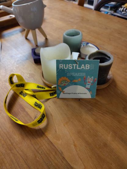 A photo of a rustlab badge on top of a table