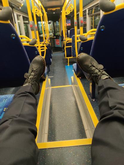 At the bus wearing DMs