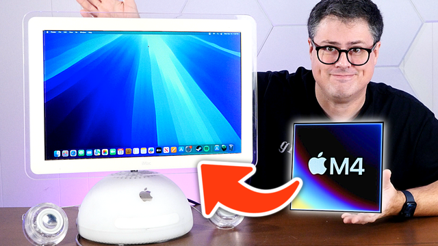 Me, grinning next to an iMac G4 running macOS Sequoia