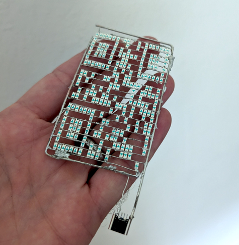 The back side showing the LEDs and a USB C plug for power.