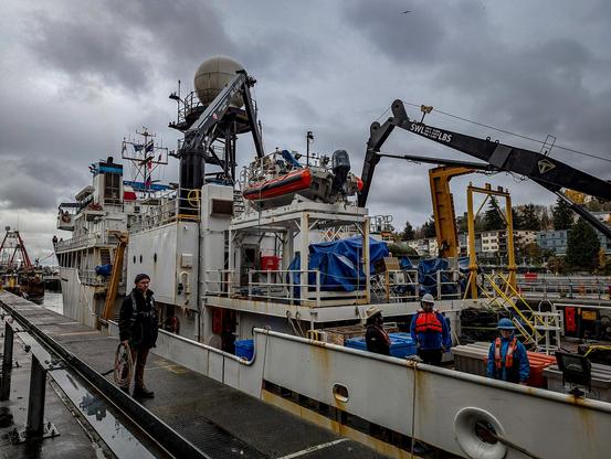 NOAA research ship enters the large locks at the Ballard Locks.