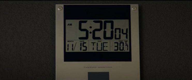 A clock showing the date as Tuesday, November 15