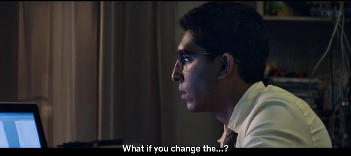 A man at a computer, musing to himself, “What if you change the…?”
