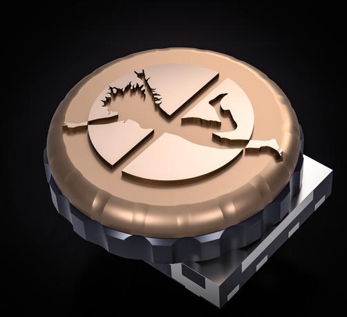 A brass clickwheel cap with a Jumperless logo embossed