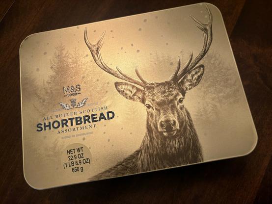 Golden rectangular cookie tin with the image of a stag of M&S “Scottish” shortbread cookies