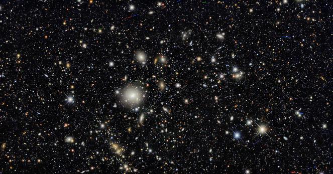 Ten areas in the sky were selected as “deep fields” that the Dark Energy Camera imaged several times during the survey, providing a glimpse of distant galaxies and helping determine their 3D distribution in the cosmos. The image is teeming with galaxies — in fact, nearly every single object in this image is a galaxy. Some exceptions include a couple of dozen asteroids as well as a few handfuls of foreground stars in our own Milky Way. Credit: Dark Energy Survey/DOE/FNAL/DECam/CTIO/NOIRLab/NSF/AURA Acknowledgments: T.A. Rector (University of Alaska Anchorage/NSF’s NOIRLab), M. Zamani (NSF’s NOIRLab) & D. de Martin (NSF’s NOIRLab)