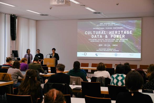 Pauline Junginger, Anne Hart & PI Sarah-Mai Dang opening the closing conference of the BMBF research group DAVIF "Cultural Heritage Data & Power" in front of a full room. 

Credits: Lars Hadeler