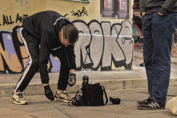 A graffiti group getting ready to paint