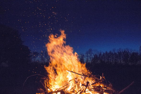 Lofted embers carried on the wind can start new spot fires.