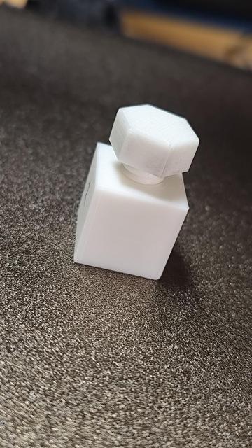 The two printed parts screwed together.