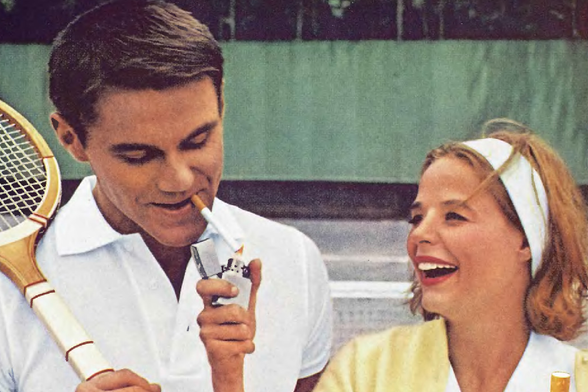 1964 Classic Tennis Break with Smokers

A man and a woman enjoying a break from playing tennis, sharing cigarettes while smiling.