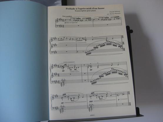 Intérieur partition : Claude Debussy, Prélude à l'après-midi d'un faune, transcription pour piano de Nicolas Hussein