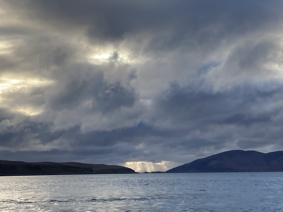 Blue grey big skies with sun breaking through