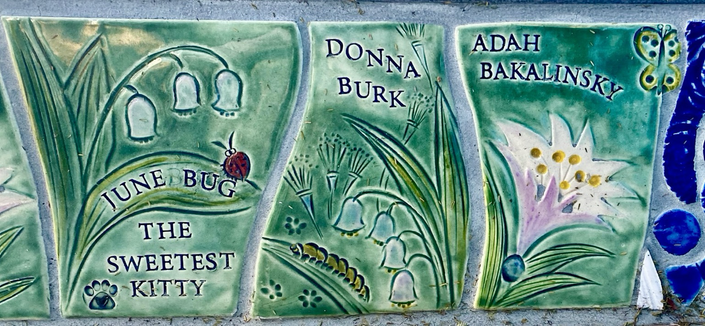 Close-up shot of decorative tiles on Burnside for June Bug the sweetest kitty, Donna Burk and Adah Bakalinsky