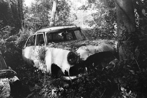 black and white photo of an old car