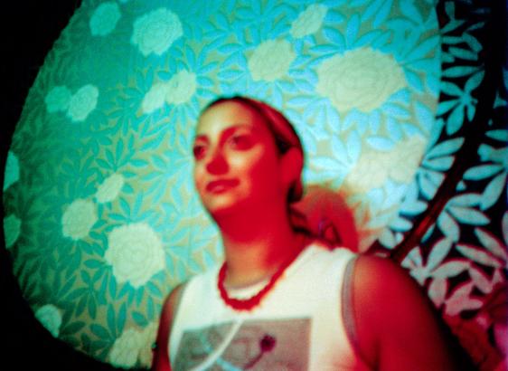 Old experimental portrait shot of a blurred girl on Agfa CT Precisa 35mm analogue film with a Lomo Lc-a camera + Colorsplash flash. Lomography.