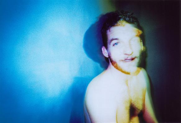 Old experimental portrait shot of a blurred man on Agfa CT Precisa 35mm analogue film with a Lomo Lc-a camera + Colorsplash flash. Lomography.