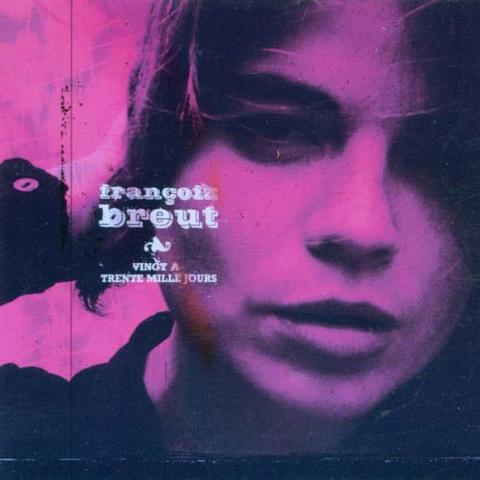 The cover art is a monochromatic close-up photo of the artist's face, looking into the camera, with bright pinks/purples replacing the light values. The artist name is in white font on top of their right cheek, with the album name in smaller font underneath.