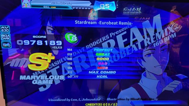 A score screen from the rhythm game Pump It Up. Stardream (Eurobeat Remix) - D18 - S+ (score 978,189).