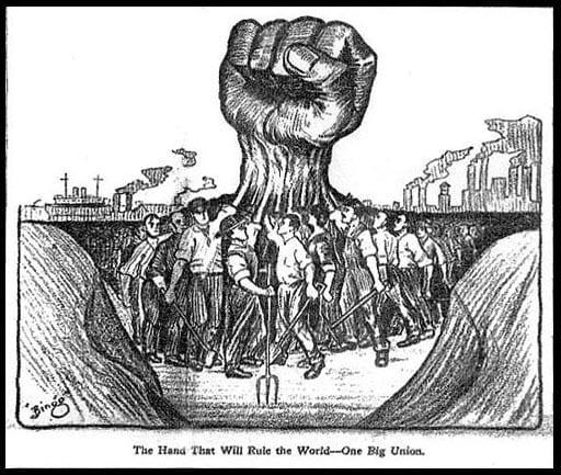The image features a massive raised fist emerging from the ground, signifying power and solidarity. Below, a diverse group of laborers marches forward, holding tools and displaying determination. Smoke rises from factories in the background, suggesting an industrial setting. The caption reads, "The Hand That Will Rule the World—One Big Union," emphasizing the theme of collective strength in labor movements.