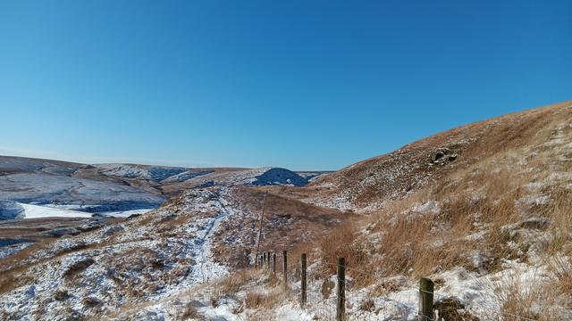 Snow covered moorland looking towards March Hill, Marsden Moor.