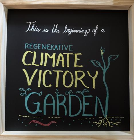 A chalkboard sign that reads “This is the beginning of a Regenerative Climate Victory Garden” in color, with plants and a worm and microbes around it.