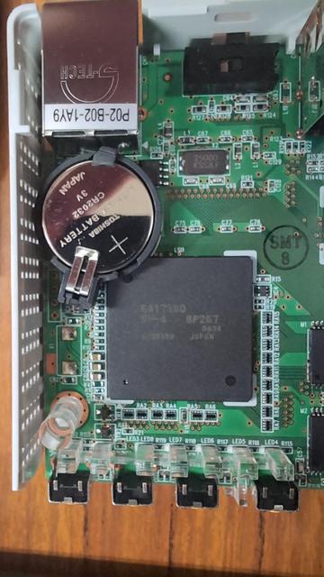 The package of Hitachi SH-4 SH7751R microprocessor inside IO-DATA USL-5P.