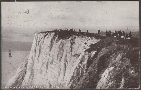 Printed sepia postcard showing a view of Beachy Head near Eastbourne in Sussex.
Published by Phototone Postcards, The WB Series, No 043.
Postally used on 25 August 1915 with Eastbourne cancellation on green halfpenny stamp, at an angle indicating 'a kiss' in the language of stamps, popular at the time, and sent to Mrs Lendon, 77 Kensington Avenue, Watford.
Good condition, with slight corner bumps and a small amount of postmark ink seeping to the front.