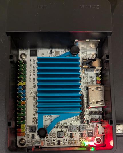Libre Computer Le Potato in a case with the top off.