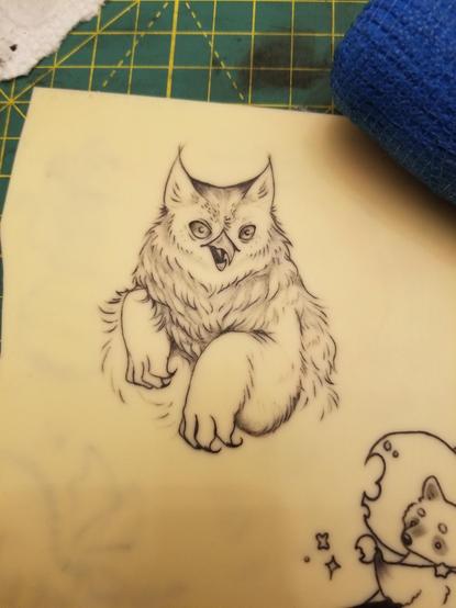 Photo of a tattoo of a fluffy owlbear on some fake skin