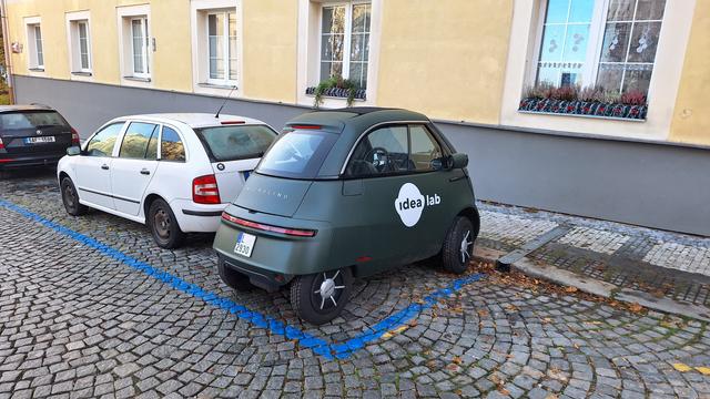 Microlino microcar parks orthogonaly