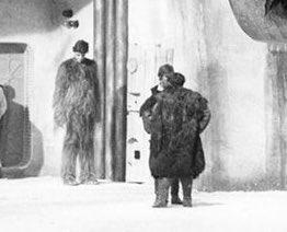 BTS photo from "Star Wars" with Peter Mayhew's head visible from Chewbacca costume