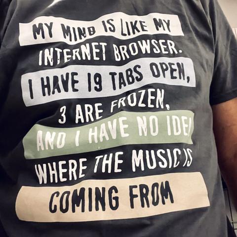 a t-shirt with text describing the user's busy internet browsing habits, including having 19 open tabs, 3 tabs being frozen, and no new ideas, while also mentioning that their mind is similar to their internet browser