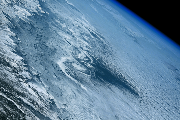 This astronaut photo shows swirls of sea ice off the Labrador coast in February 2024.