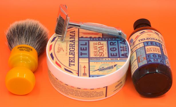 A GEM G-Bar on a tub of IA Telegrama soap with a bottle of matching splash, and a beautiful butterscotch Zenith badger brush.