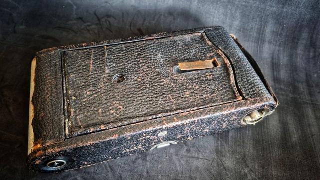 A closed Kodak 3A Folding Pocket camera (this was tge only way to show the whole camera in landscape).