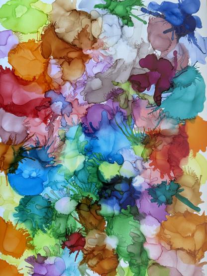Alcohol art painting with many colorful shapes blending into each other