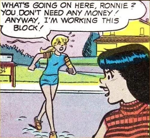 A comic panel featuring two characters: a blonde girl in a blue outfit jogging toward a girl with black hair wearing a red striped top. Betty is speaking, expressing that she doesn’t need money and is working the block, while Veronica looks shocked.