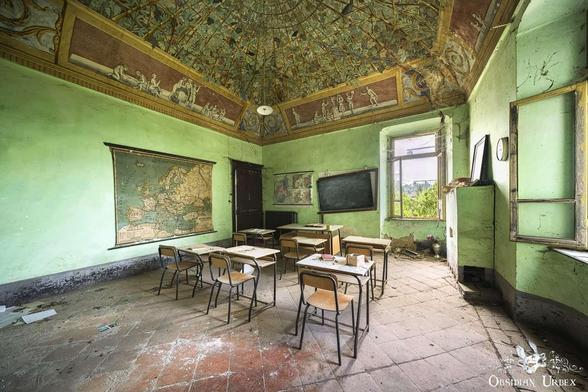 old classroom, green walls and ornate ceiling