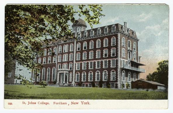 The image shows a vintage postcard of St. John's College in Fordham, New York. The college building is prominent and features multiple stories with numerous windows framed by white trim. Its architecture includes gabled roofs and decorative brickwork around the corners and on certain walls. A small cupola or dome crowns one section at the top. In front of the building, there's a lush green lawn that stretches across most of the visible area in the photo. Trees with green foliage flank both sides of the picture, suggesting it might be spring or summer when this image was captured. The sky is not fully visible but hints towards daylight conditions through an orange-yellow hue near the horizon line, possibly indicating either sunrise or sunset. Text at the bottom left corner indicates "St. Johns College" and provides additional location details for Fordham in New York along with a number that might be indicative of its sequence within a collection.