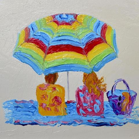 An impressionist beach painting with a colorful striped umbrella and a couple sitting on beach chairs on a blue beach towel. The girl has long flowing red hair and has a basket next to her. This beach seascape was painted with a palette knife for a luscious thick texture.