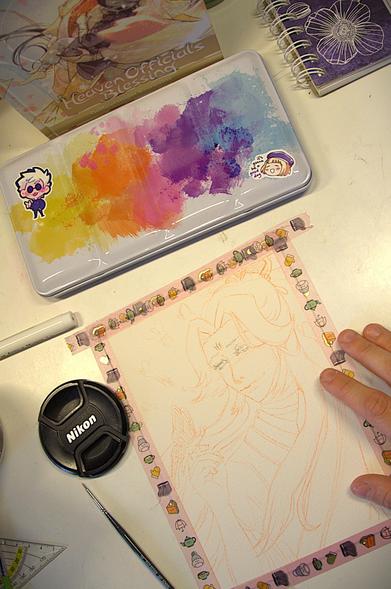 Picture of my desk with new art on it