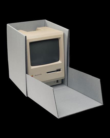 Macintosh computer in a gray archival box on a black background.