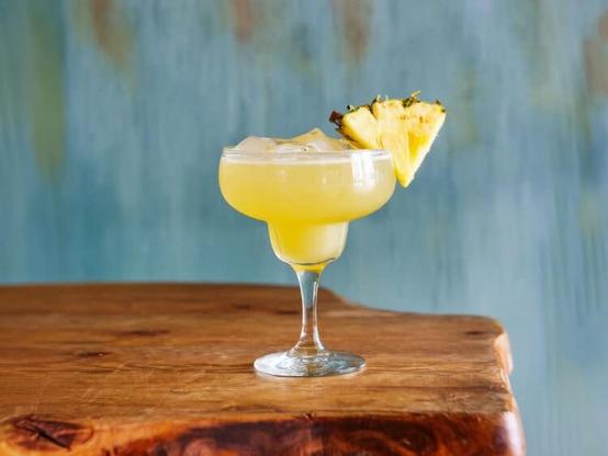 Cactus Bowl drink with pineapple wedge