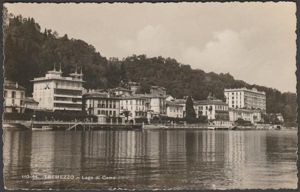 Monochrome real photographic postcard showing a view of Tremezzo on the shores of Lake Como in Lombardy, Italy.
Published by Brunner & C, Como, No 1110-44, c.1930s.
Postally unused.
Very good condition, with slight corner bumps.