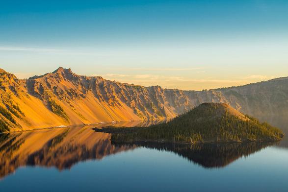I drove for an hour to get here at 5am so that I could capture Wizard Island in Crater Lake at golden hour.                            For more information, go to:                                                                          <a href="https://en.wikipedia.org/wiki/Wizard_Island" rel="noreferrer nofollow">en.wikipedia.org/wiki/Wizard_Island</a>